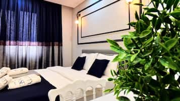 Appart'hôtel Familial, balcon, vue ville | Literie de qualité supérieure, minibar, coffres-forts dans les chambres