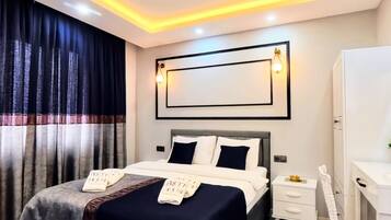 Family Condo, Balcony, City View | Premium bedding, minibar, in-room safe, soundproofing