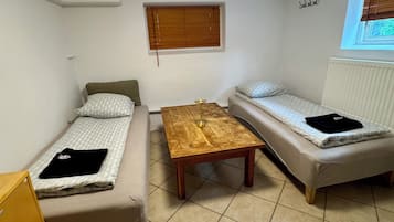 Economy Room, 2 Single Beds, Non Smoking | Blackout curtains, iron/ironing board, free WiFi, bed sheets