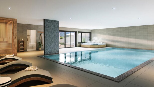 A modern indoor swimming pool with a hot tub, lounge chairs, and a view of the outdoors. - 4-room Duplex Apartment for 8 People With Sloping Ceilings (Saint-Gervais-les-Bains)