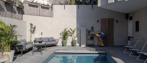 Outdoor pool, sun loungers