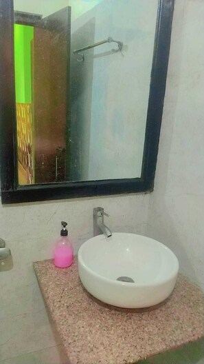 Shower, free toiletries, towels, soap