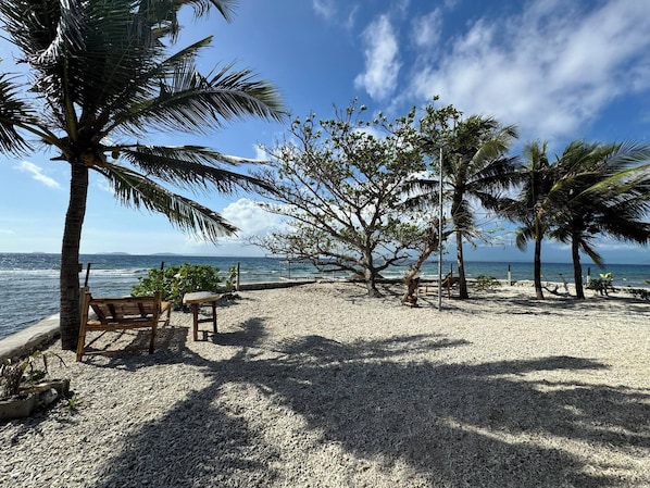 On the beach, sun loungers, beach towels