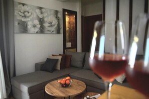 FamiljelÀgenhet - uteplats - havsutsikt | Vardagsrum | Eldstad