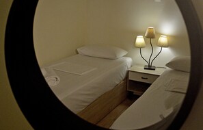 Family Apartment, Patio, Sea View | Individually furnished, laptop workspace, blackout drapes, soundproofing - Malvazios Villas (Gytheio)