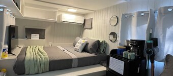 Terrys bungalow on the rivers edge with AC/Heat in a private campground!