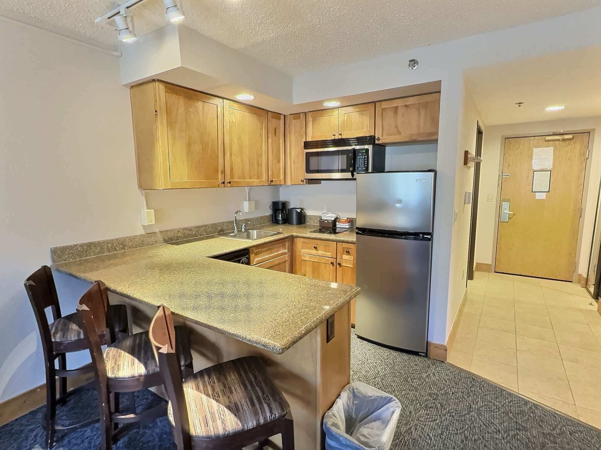Microwave, stovetop, dishwasher, coffee/tea maker