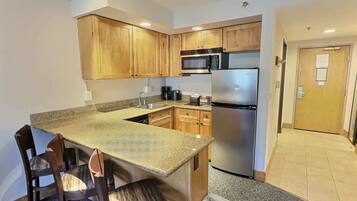 Microwave, stovetop, dishwasher, coffee/tea maker