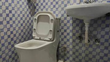 Shower, towels, soap, shampoo