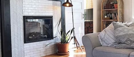 Smart TV, fireplace, books
