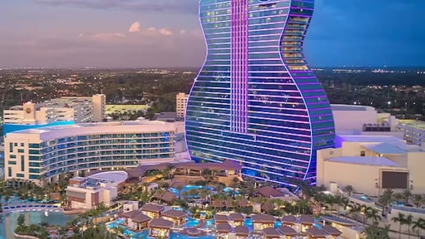A resort with a large pool area, multiple buildings, and a distinctive guitar-shaped hotel. - ★Miami Spacious Retreat 10 ninutes to Ocean • BBQ Pool Firepit• Sleeps 20+★ (North Miami Beach)