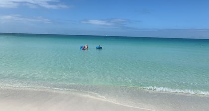 Gulf Beach Retreat, just steps from the sand of Anna Maria! Private heated pool