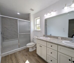 Hair dryer, towels, soap, toilet paper