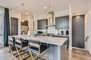Fridge, microwave, oven, stovetop - Luxury Gulch Condo w/ Private Rooftop Deck (Nashville)