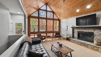 Smart TV, fireplace, foosball, books