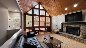 Smart TV, fireplace, foosball, books