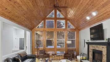 Smart TV, fireplace, foosball, books