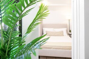 2 dormitorios, tabla de planchar con plancha, wifi y ropa de cama