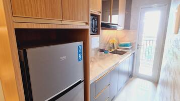 Appartement Deluxe, vue ville | Coin séjour