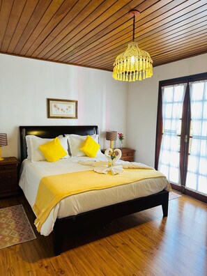 Deluxe Quadruple Room, Balcony, Garden View | In-room safe, iron/ironing board, free WiFi