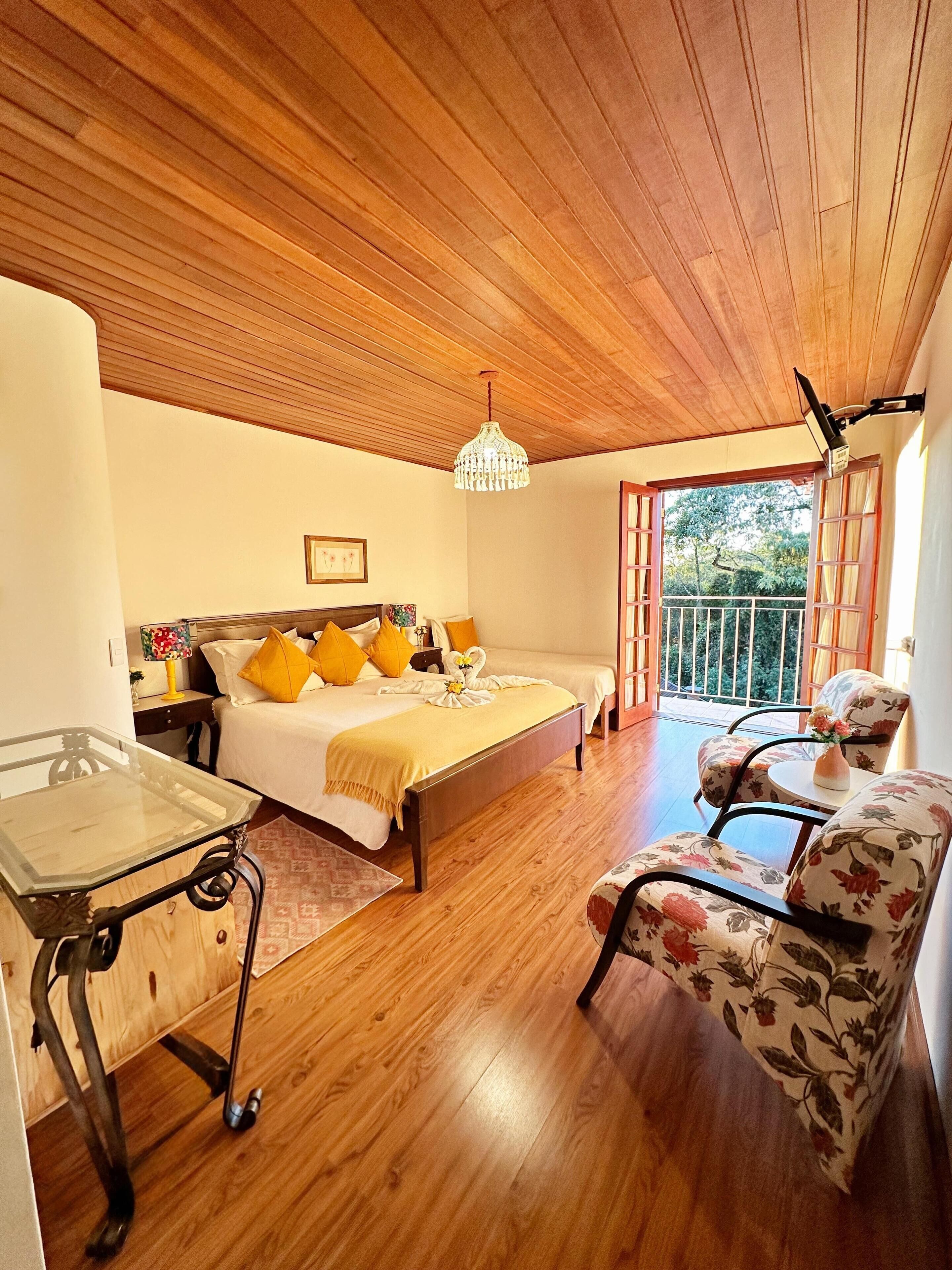 디럭스 쿼드룸, 발코니, 정원 전망 | 객실 내 금고, 다리미/다리미판, 무료 WiFi