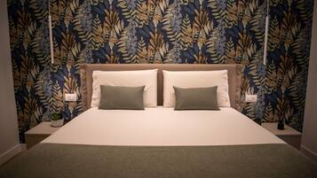 Iron/ironing board, travel crib, free WiFi, bed sheets