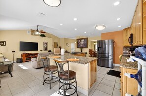 Fridge, microwave, coffee/tea maker, cookware/dishes/utensils