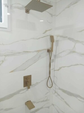 Shower, hair dryer, towels, soap