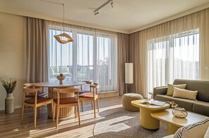 Penthouse, 3 Bedrooms, City View | Living area | 55-inch flat-screen TV with cable channels - Marone Suites Budapest (Budapest)