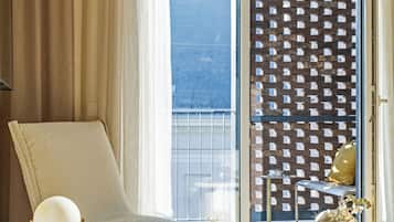 Apartment, 2 Bedrooms | Living area | 55-inch flat-screen TV with cable channels