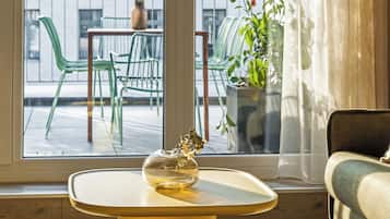 Apartment, 2 Bedrooms, City View | Living area | 55-inch flat-screen TV with cable channels