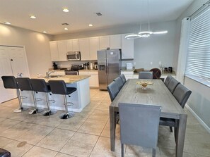Fridge, microwave, oven, stovetop - Lakeview Retreat w/ Pool – Near Disney (Kissimmee)