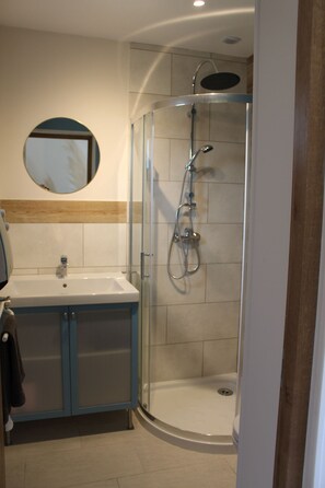 Shower, towels, soap, toilet paper