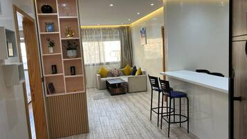 Appartement Standard, vue ville | Coin séjour