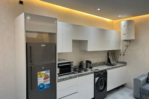 Apartament estàndard | Cuina privada | Rentaplats, cafetera exprés, cafetera i tetera i bullidora elèctrica