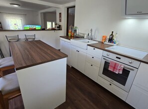 Villa (Four Bedroom Villa with the Pool) | Private kitchen | Fridge