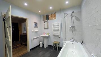 Eco-friendly toiletries, hair dryer, towels, soap