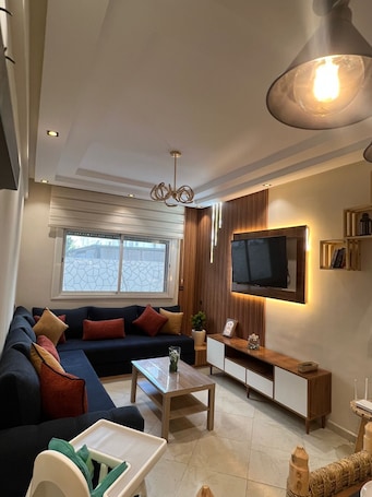 Living area. Pleasant 2-BD apartment with fitness room, free parking and pool in El Jadida