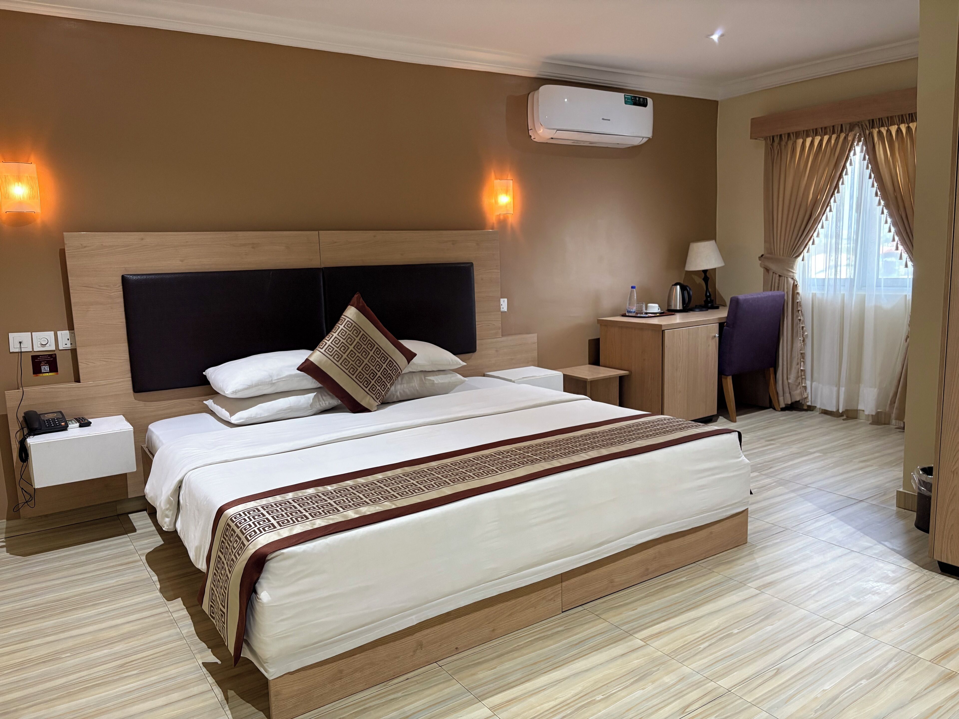 Deluxe Room, City View | In-room safe, desk, laptop workspace, soundproofing