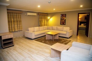 In-room safe, desk, laptop workspace, soundproofing - Visa Karena Hotels (Port Harcourt)