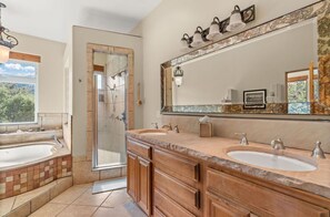 Jetted tub, hair dryer, towels, soap