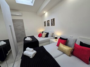 3 عدّة غرف نوم ومكواة/لوح كي وواي فاي وملاءات أسرّة