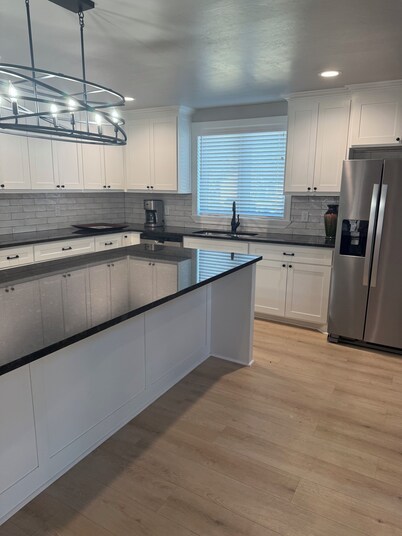 3-bedroom 2 and a half bath bungalow in superb Woodward with a warm fireplace!