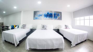 Family Studio, 1 Bedroom, Air conditioning, City View | Iron/ironing board, free WiFi, bed sheets