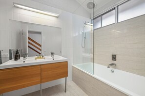 Shower, hair dryer, towels, soap