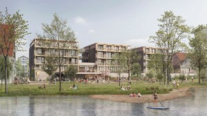 A modern building with multiple balconies overlooking a park and a body of water. - Belsers Hotel (Nuertingen)