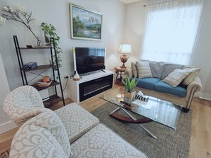 Living area - Cozy 3-Bedroom/2-Washroom House | Sleeps 6 | 5 Minutes to Subway | Free Parking (Toronto)