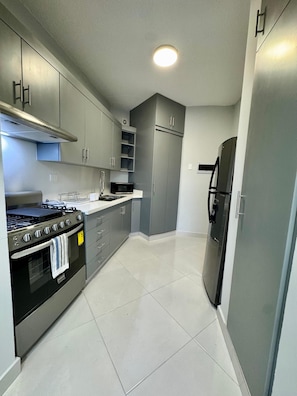 Microwave, oven - Your ideal getaway in Puerto Plata: Beach & Fun (Puerto Plata)