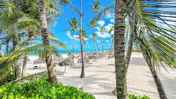 Beach nearby, white sand, beach towels, beach massages