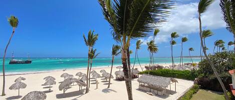 On the beach, white sand, 4 beach bars